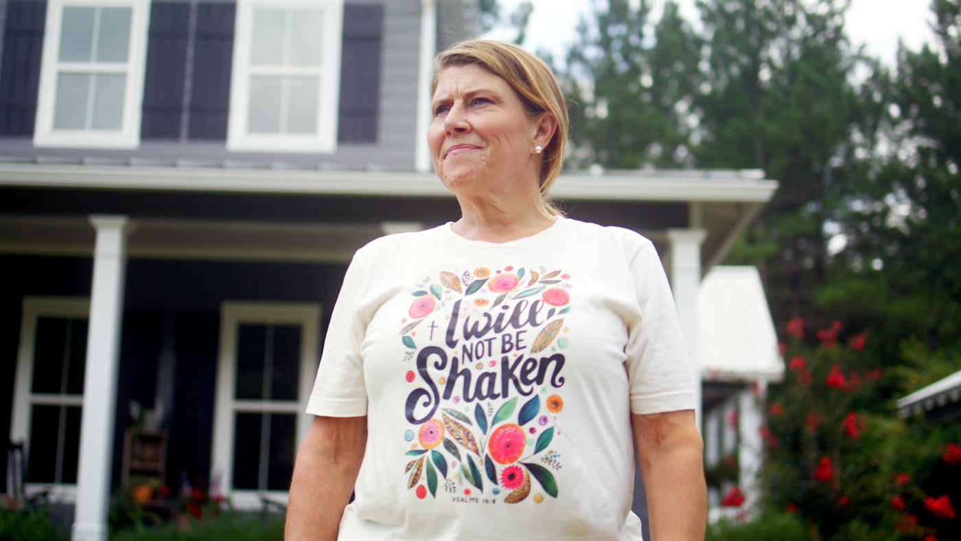A documentary portrait outside a family home