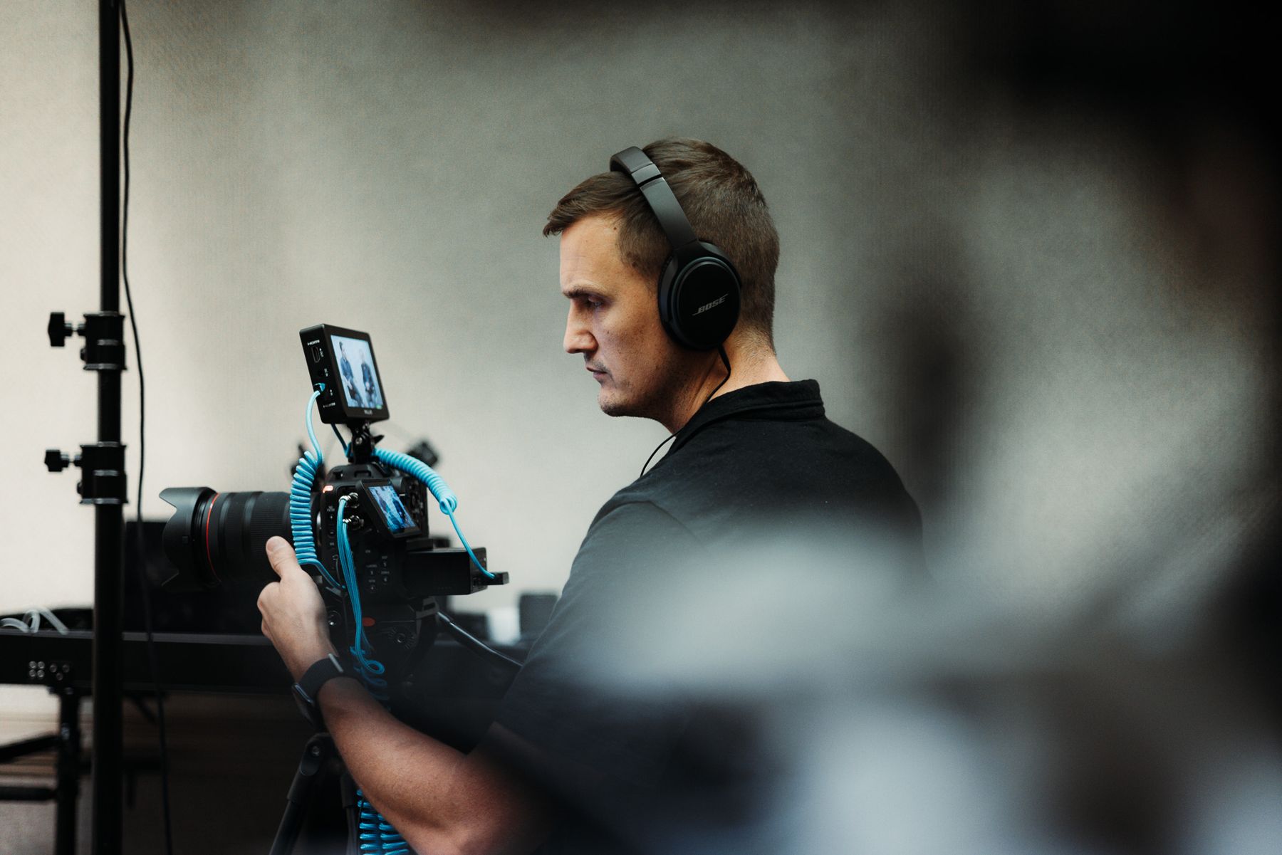 A camera operator on a handheld rig
